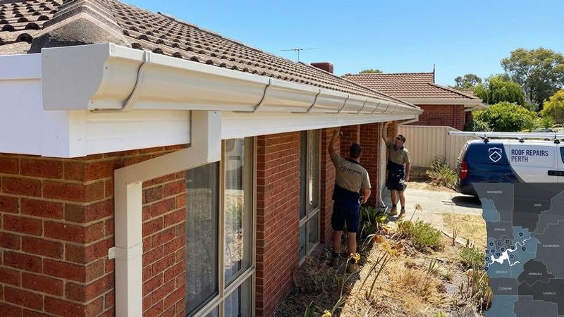 Completed Colorbond gutter replacement on a Perth home with new brackets and neat downpipe connection at corner junction
